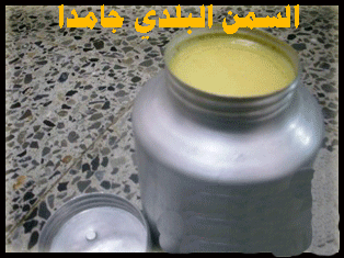 الدبيه الحاويه على اللبن والمعلّقه بهندول